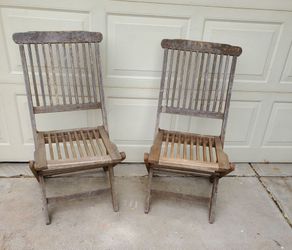 2 teak wood folding chairs