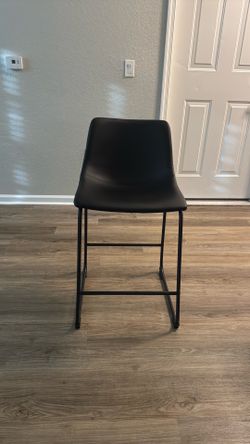 Black leather barstools