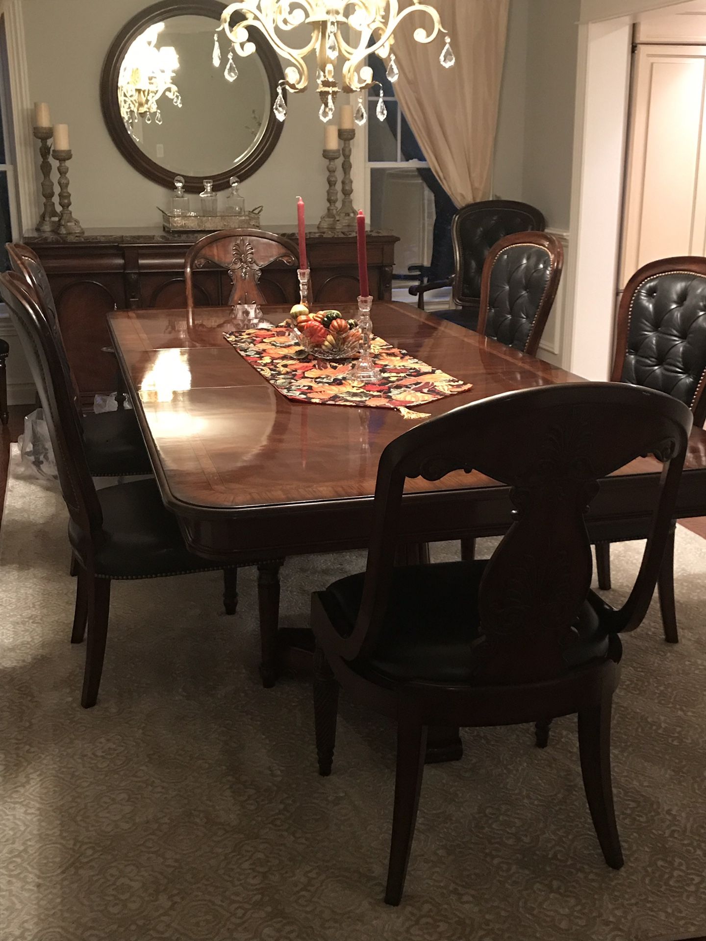 Henredon dining set with marble buffet. Just like new. 8 chairs, 2 with ornate wooden backs.
