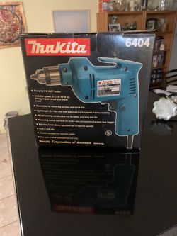 Makita 3/8 corded drill. New, never used.