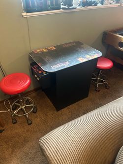 Midway Table top gaming console w/64 Vintage-ish games w/stools. Everything is in good working order all knobs and buttons work. This would be great f