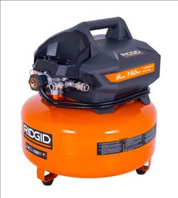 Ridgid air compressor with long hose and nail gun attachment