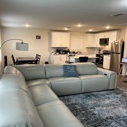 leather sofa with three recliners 