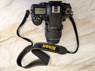 NIKON D7000 DIGITAL SLR CAMERA WITH AF-S DX NIKKOR 18-55MM F/3.5-5.6G GII ED VR LENS