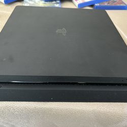 PS4 1TB Slim with 2 Controllers, 5 Games & Charging Station