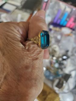 Large Blue stone ring size L 1 prong missing  as is