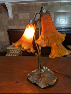 16" Art Nouveau-style multi-light accent table lamp featuring amber-toned blown art glass lily shades