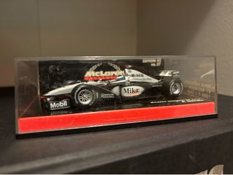 Minichamps 1:43 Mika Hakkinen 1999 McLaren Mercedes MP4/14 WORLD CHAMPION F1 GP