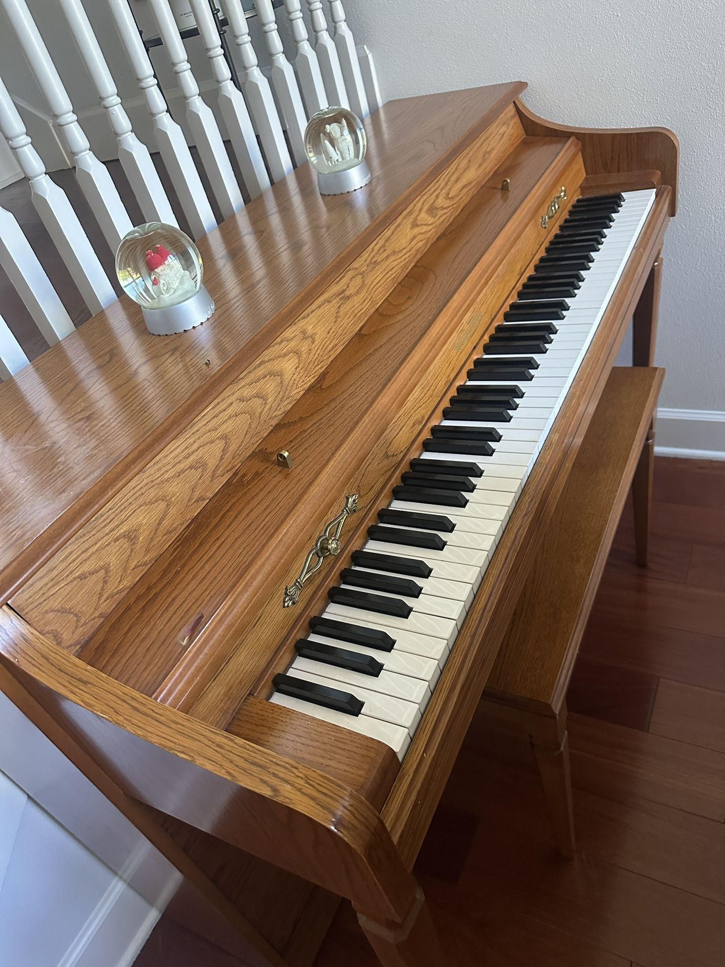Baldwin Classic Upright Piano in an oak finish