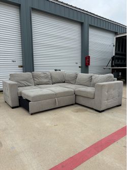 Beautiful Grey Sectional Couch With Pop up Bed Delivery Available 🚚