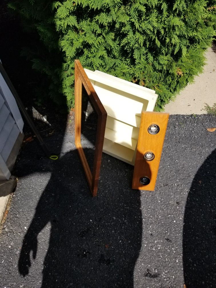 Needs to go small bathroom mirror with matching light fixture set great condition dont need