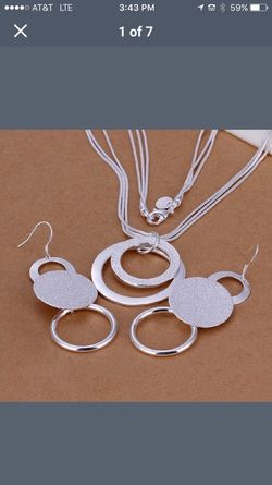 Silver necklace and earring set