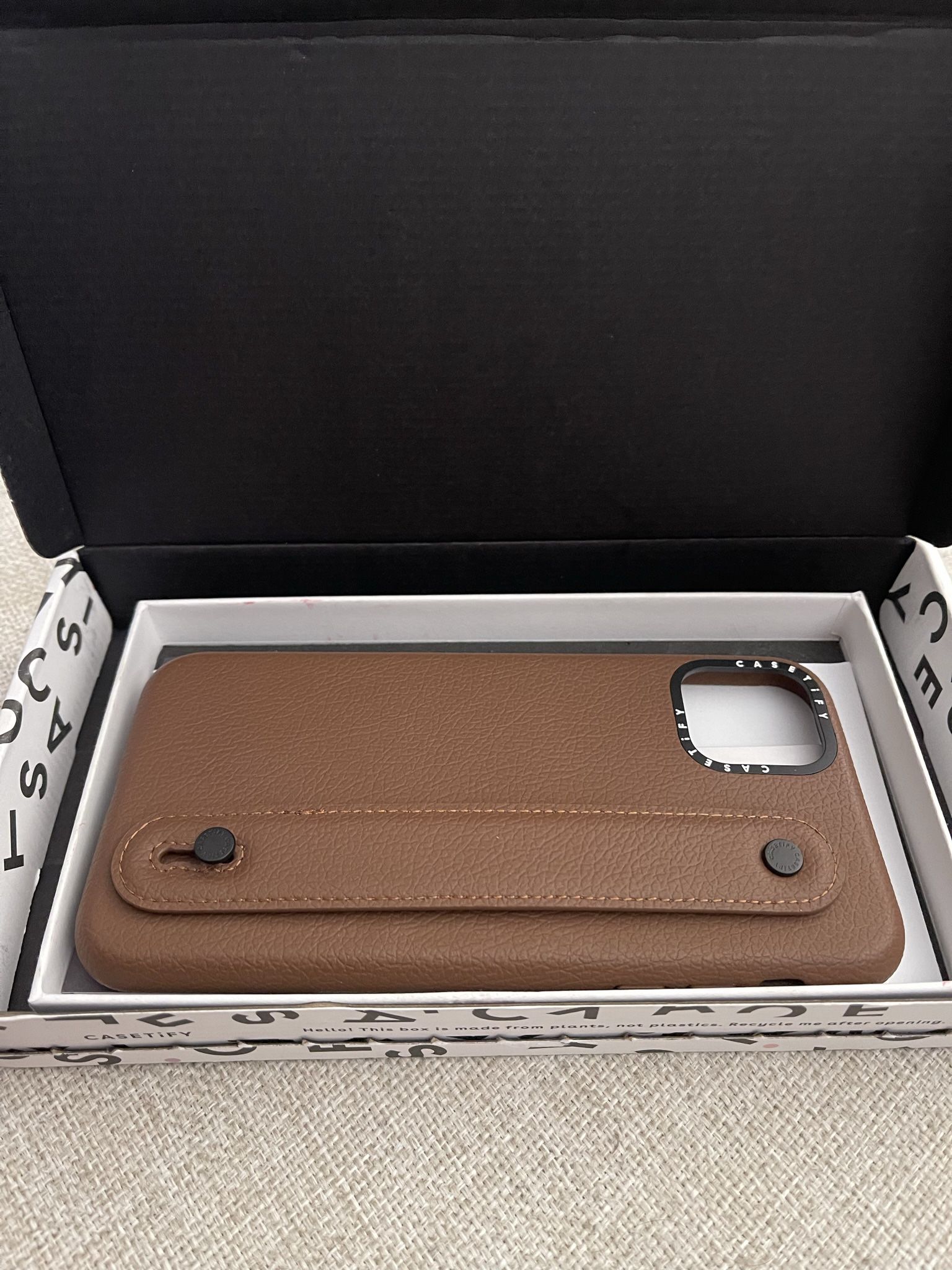 Casetify IPhone 11 Pro Max Leather case with strap to hold comfortably and acts as a phone stand. You can customize with charms (not included)  - NEW