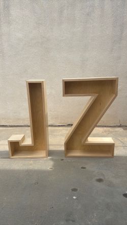 Wooden letter Z and J