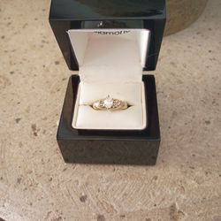 1/2  Carat Diamond Ring With Baquet Diamonds 