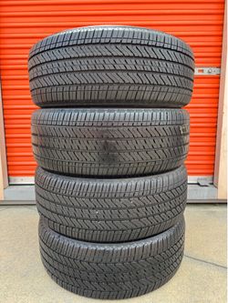 4 Used Bridgestone 275/50R22 Tires