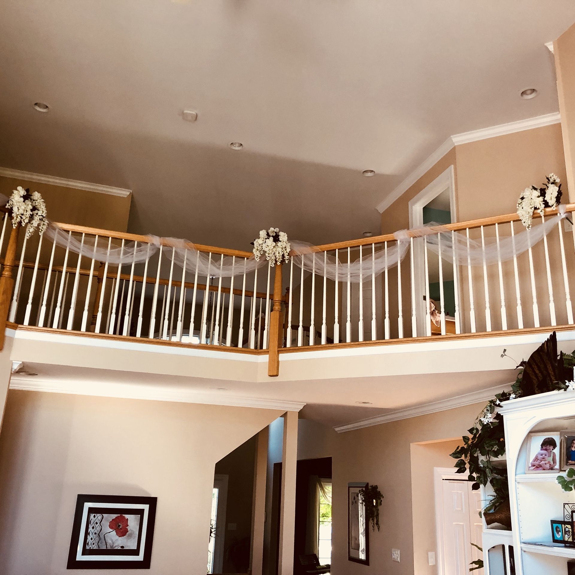 Staircase and Railings Floral and Tulle Wedding decorations