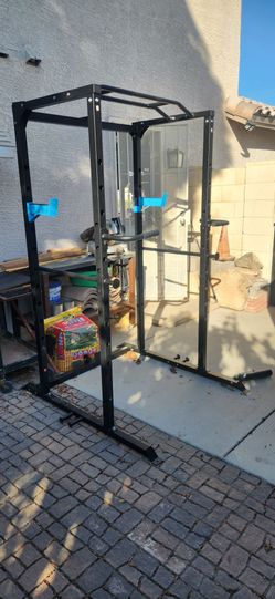 Squat rack and dumbell 3 tier holder and pully system