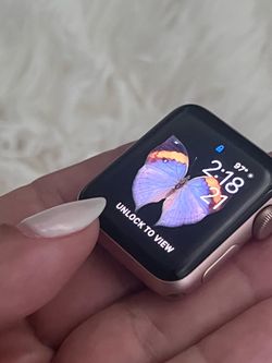 an Apple Watch Series 3, 38mm, Rose Gold Aluminum
