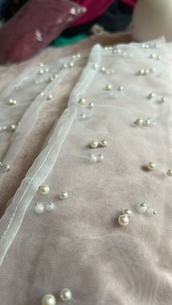 White long pearl sleeves