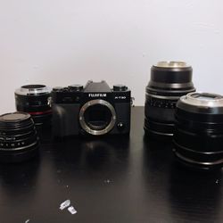 Black Fujifilm Xt-30 With 50mm 1.7, 35mm 1.6, 18-55mm 3.6, And Rokinon 85mm 1.4