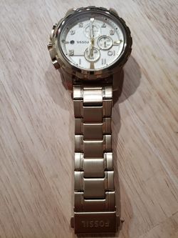 Men Gold Fossil watch $120. Excellent condition