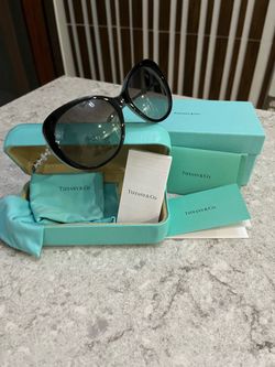 Tiffany & Co. TF4053-B sunglasses in black and blue.