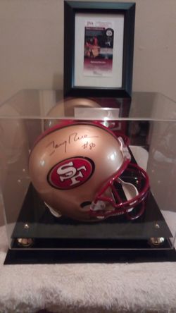 Authentic hand sighed Jerry rice riddle full size helmet in mirrored display case with JSA certificate of authenticity