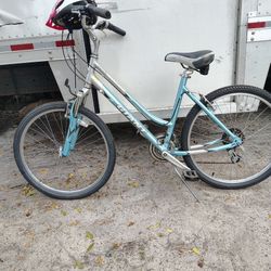 Light blue Giant bicycle ladies with a helmet included.$75. Located Mount Dora Fla 32757
