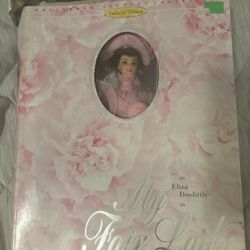 This is the My Fair Lady Barbie from the Hollywood Legends Collection by Mattel, featuring Eliza Doolittle in her stunning pink Ascot gown. The dress 
