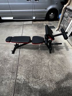 Adjustable weight bench with leg lift