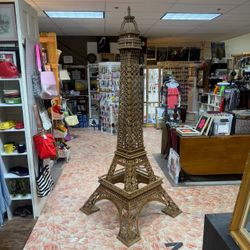 Hand made 96” tall wood scale reproduction of the Eiffel Tower located by the Miami Design District