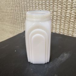 vintage McKee Glass Co. Roman Arch sugar shaker, likely manufactured during the 1930s in an Art Deco style.  Material: The shaker is made of white mil