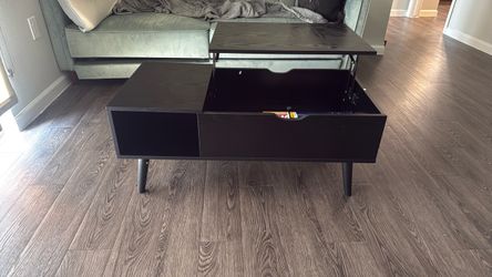 Opening coffee table