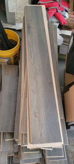 Grey Wood-Look Laminate Flooring Planks (covers one bedroom and a closet, premium quality)