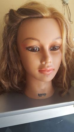 Cosmetology manikin human hair. 12"