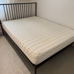 Black Metal Queen Bed Frame With Purple Mattress