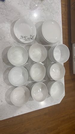 White Ceramic Dinnerware Set with Floral Detail