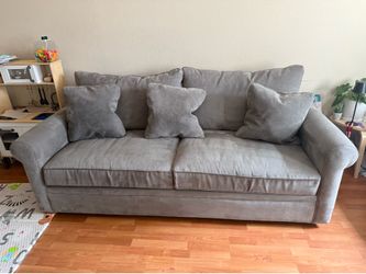 Grey sectional and Love seat couches