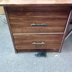 two-drawer walnut wood filing cabinet.
