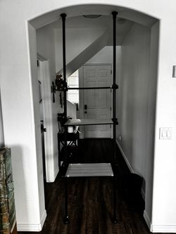 Black Floor-to-Ceiling Tension Pole Shelf Unit
