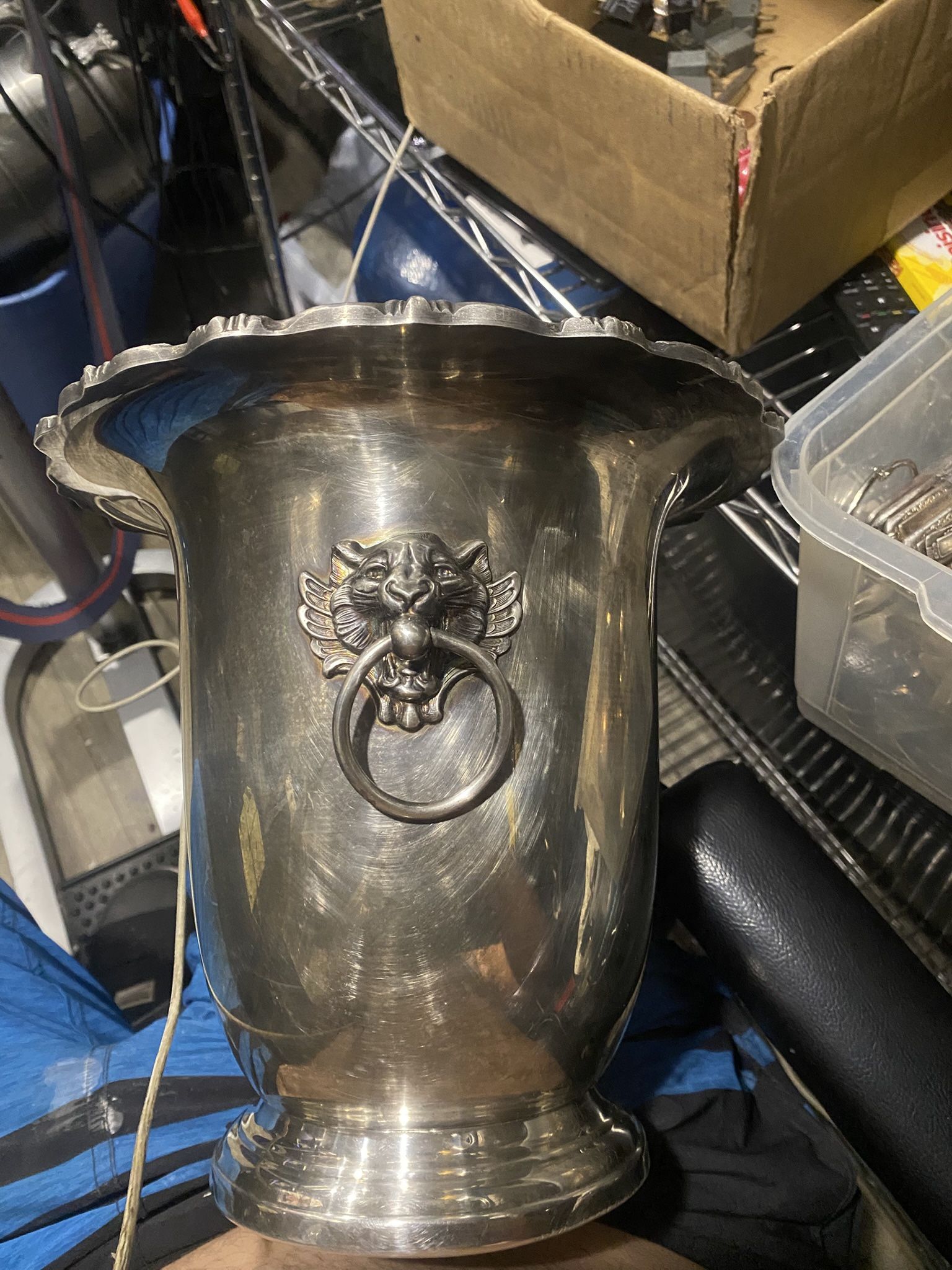 Poole & Silver company Silver Plate wine bucket with lions head handles. Excellent condition estimated value $350 Delivery available