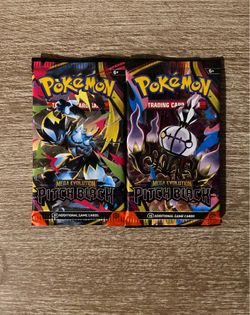 2 sealed Pitch Black Pokemon booster packs