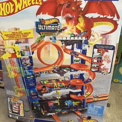 Brand new Hot Wheels City Ultimate Garage Playset: Plastic Toy Vehicle Set, Includes Car, Non-Powered.