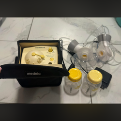 Medella breast Pump Set with portable bag All for $50