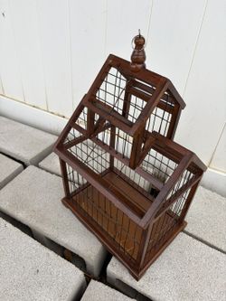 Vintage or antique wooden bird cage