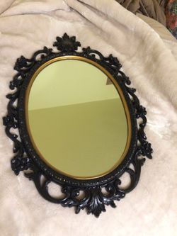 Black and gold mirror