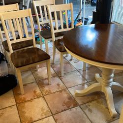 Signature Design by Ashley Whitesburg round Dining Room Table