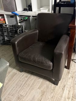 Two Leather Chairs