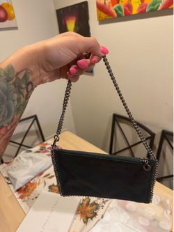 Stella McCartney Falabella shaggy deer wristlet clutch purse